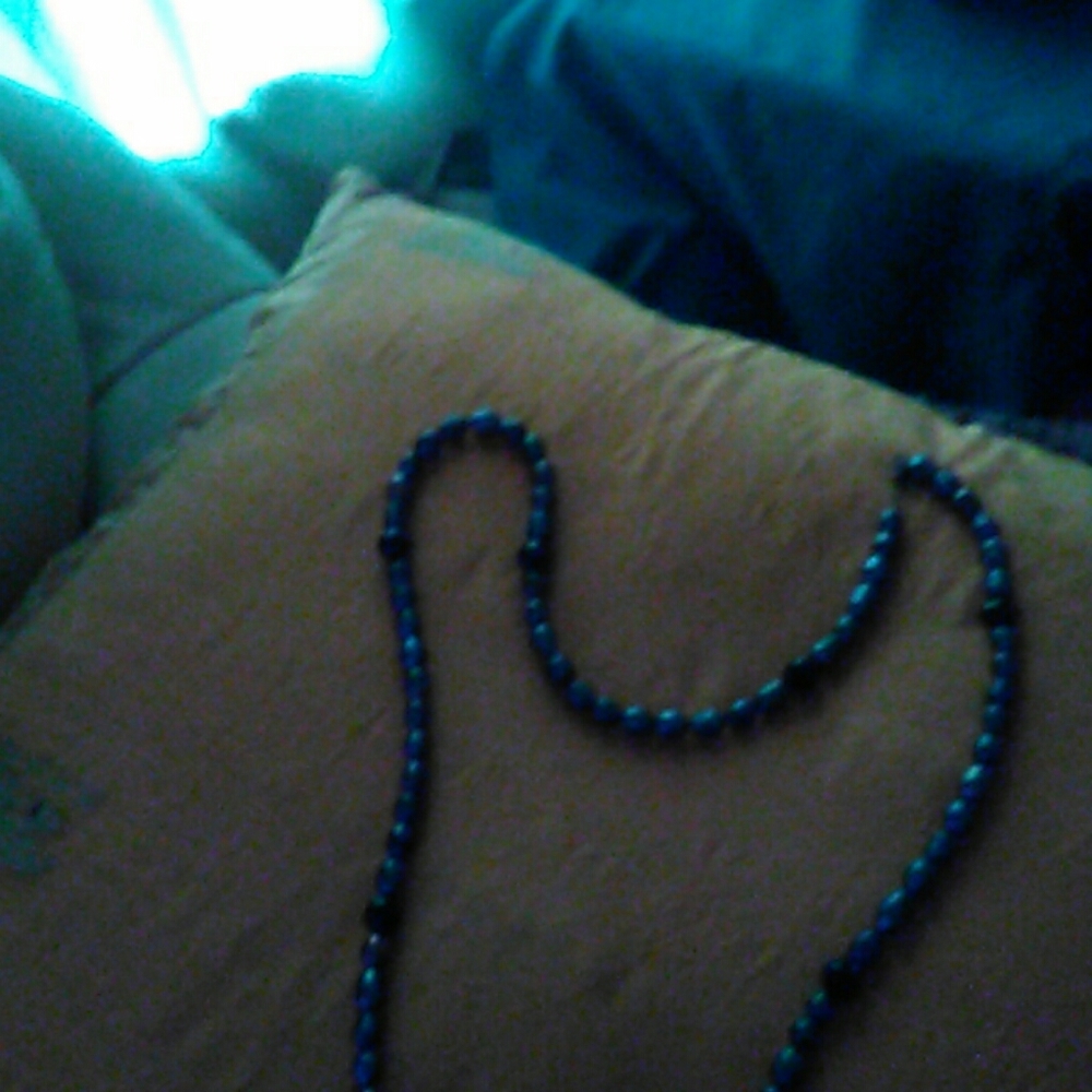 A black Pearl  necklace l